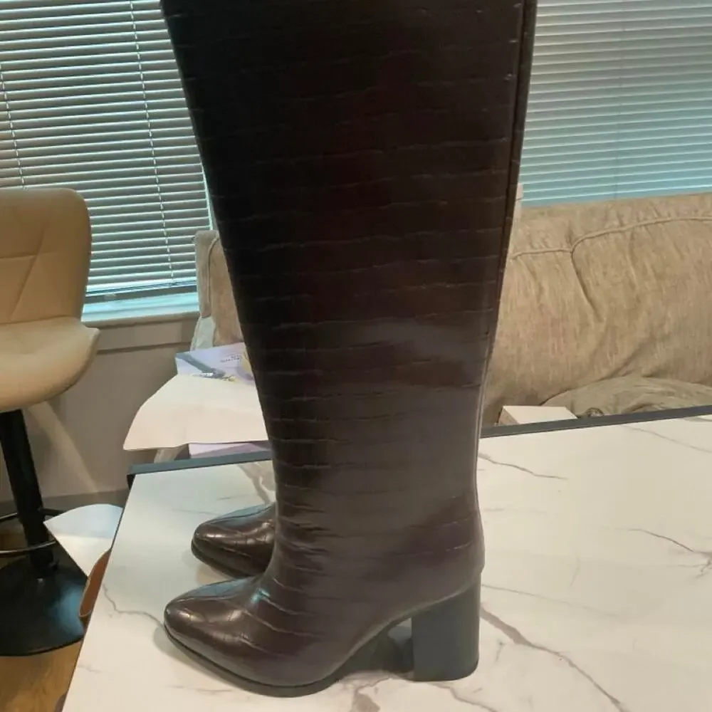 Brown crocodile textured knee high boots